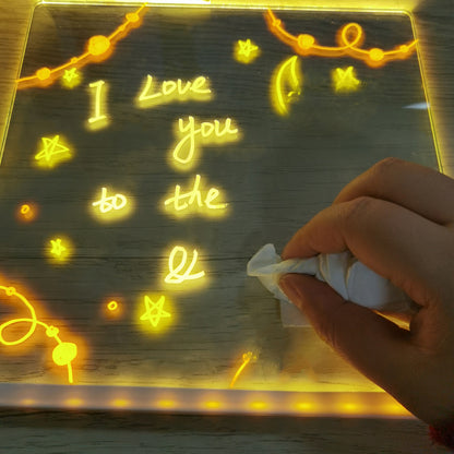 Handwriting on a transparent board with glowing yellow text and decorative elements.